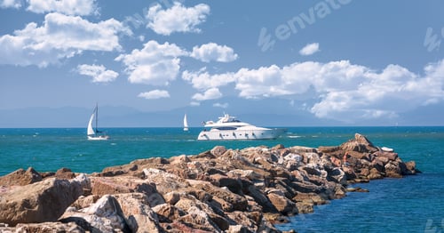 Preview: Yachts and sailing boats sail near the pier. Mediterranean Sea. Italy