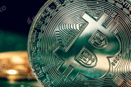 Preview: golden bitcoin and computer chip in background
