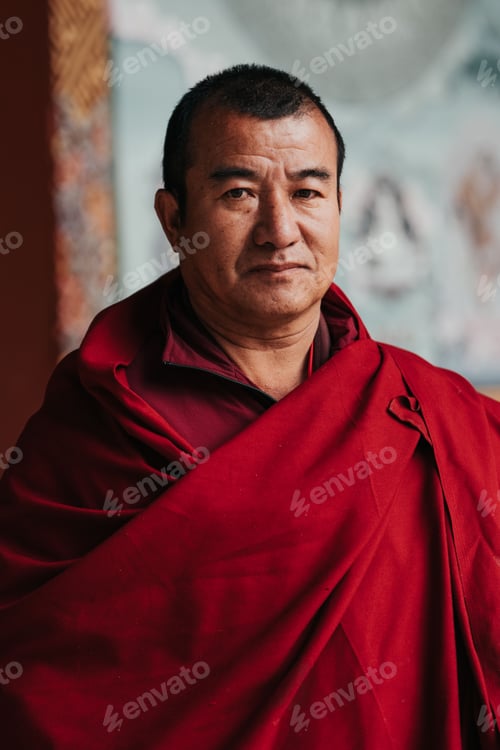 Preview: Portrait of a Tibetan Buddhist monk at the ancient Thimphu Dzong Temple and Fortress in Bhutan