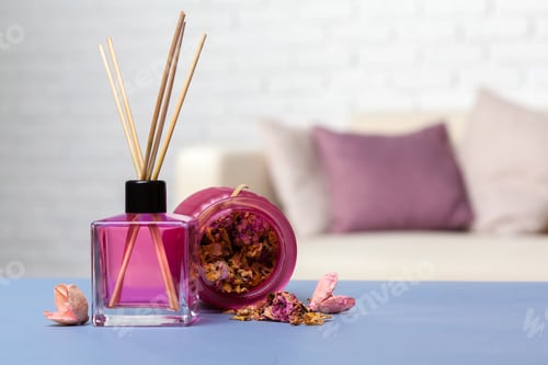 Preview: Fragrant home decor with scented diffuser and dried flower jar on blue table