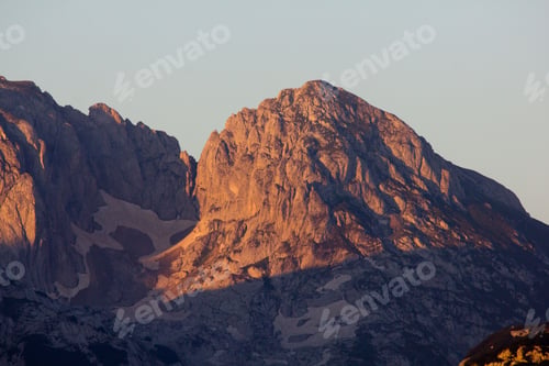 Preview: Golden Sunlit Mountain Peak
