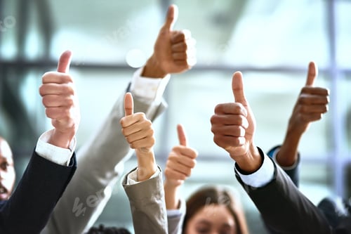 Preview: Need we say more. Cropped shot of a group of businesspeople giving thumbs up in a modern office.
