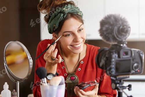 Preview: Energetic female cosmetologist presents information online, conducts video lessons how to apply eyes