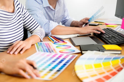 Preview: designer graphic creative creativity working together coloring using graphics tablet and a stylus at