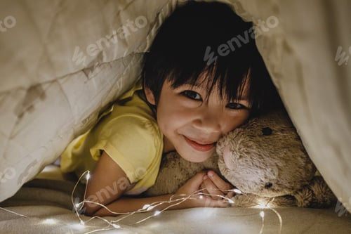 Preview: Playing with her teddy bear