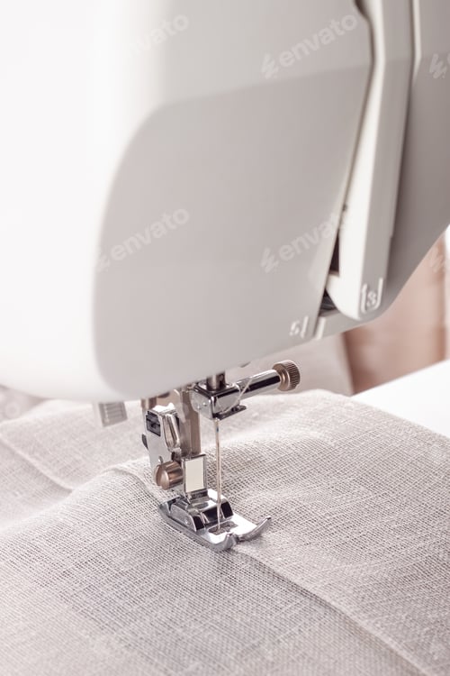 Preview: Modern Sewing Machine Presser Foot With Linen Fabric And Thread, Closeup