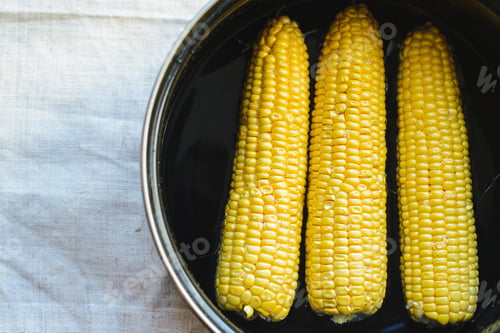 Preview: Cooking corn in a pan in the kitchen