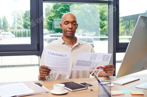 Preview: inclusion, african american man with myasthenia gravis disease holding contract, dark skinned office