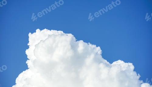 Preview: fluffy clouds or rainy clouds across blue sky.