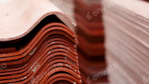 Preview: Stack red roof tiles, raw material for industrial of construction. Stock footage. Warehouse with red