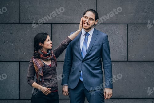 Preview: Businessman and woman fighting