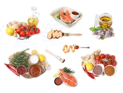 Preview: Different types of fish marinade, salmon and herring pieces on white background