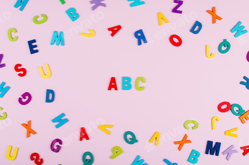 Preview: Back to school concept. Bright multicolored alphabet background. Colorful wooden letters
