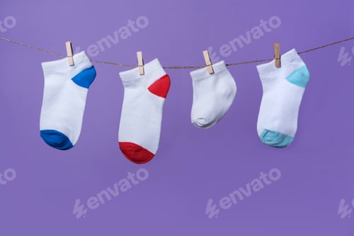 Preview: Premature baby day concept. Tiny socks