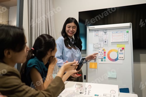 Preview: Diverse Team Collaborating in Modern Office Setting with Creative Business Presentation on