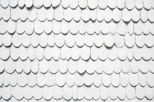 Preview: old wooden shingles siding painted white