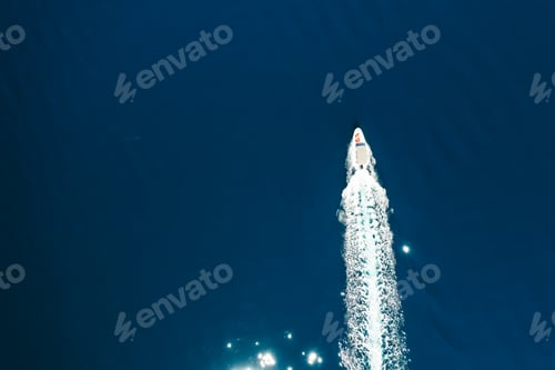 Preview: Top view of the boat or white yacht sails on the blue water of the Adriatic sea