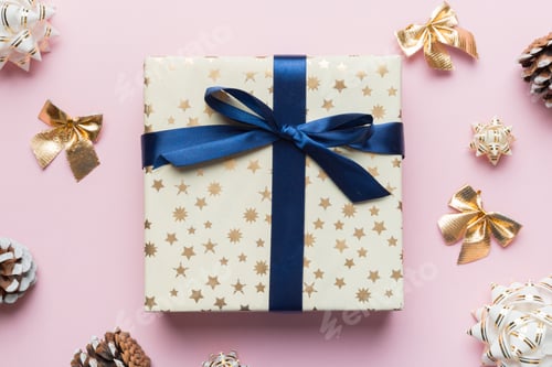 Preview: Celebration with Gift Box and Decorative Pinecones