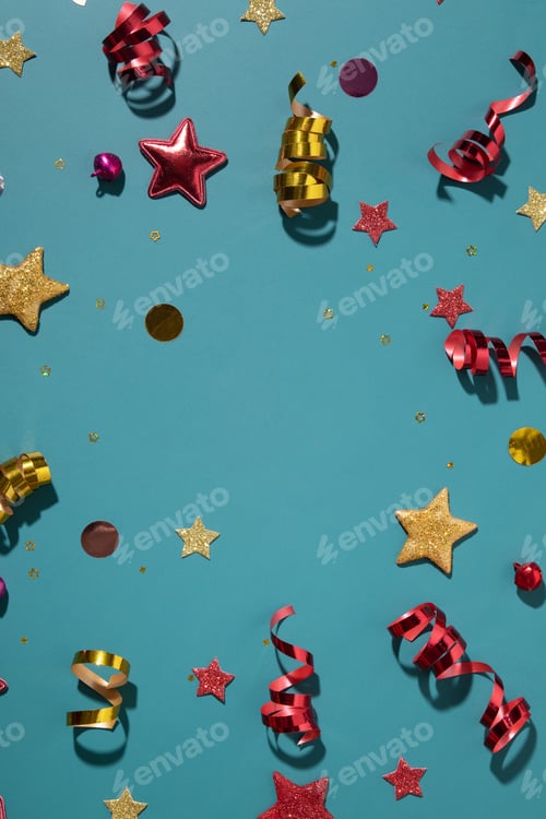 Preview: Festive background for winter holidays with color sparkles, stars, confetti, streamers flat lay
