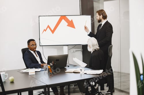 Preview: Three busines partners men in the office