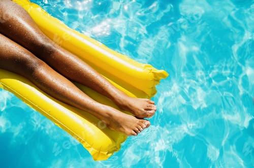Preview: Sexy woman swims on mattress in the pool, top view