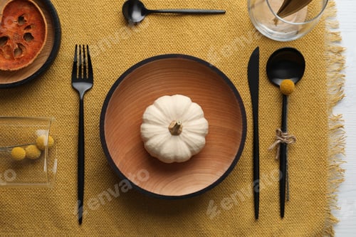 Preview: Autumn table setting with pumpkin on white background, flat lay