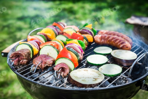 Preview: Roasting fresh vegetables and red beef with spices in garden