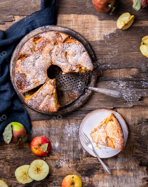 Preview: Apple pie on a wooden background. Fragrant autumn baking.