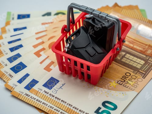 Preview: Mini red shopping basket with fuel cans on top of 500 euros cash. Fuel price concept