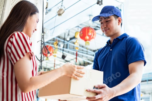Preview: Postman delivers the parcel to the girl at home with smile.