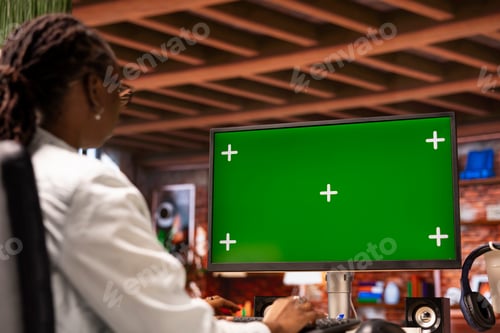 Preview: Woman inputting data on chroma key PC, completing spreadsheets in home office