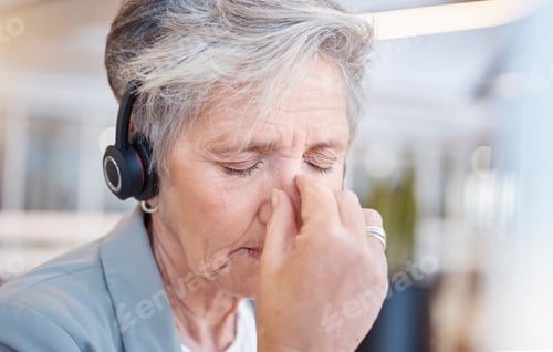 Preview: Senior woman, headache and tired at call center with stress from consulting, telemarketing or crm j