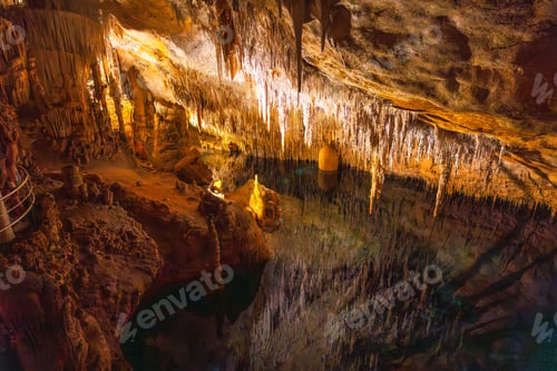 Preview: Stalactites reflecting on underground lake in caves of drach