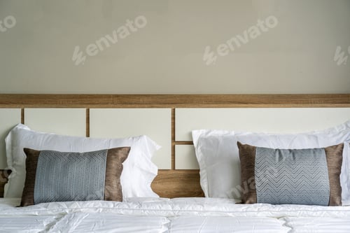 Preview: Closeup pillows in Luxury Interior bedroom, service apartment and Accommodations Concept