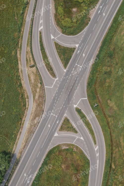 Preview: Aerial shot of empty road intersection from drone pov