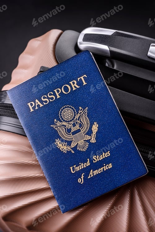 Preview: International passport of a USA citizen on a suitcase