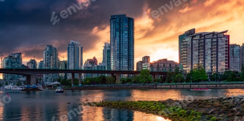 Preview: Residential Home Buildings in Modern City. Dramatic Sunset.