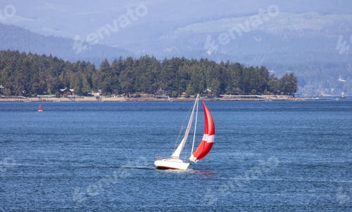 Preview: Sailboat in Canadian Landscape by the ocean and mountains.