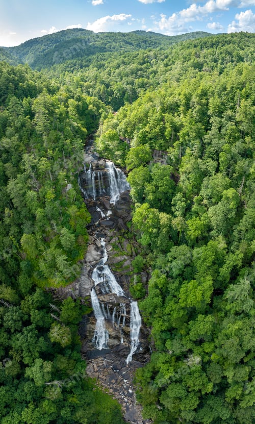 Preview: Beautiful landscape of high waterfall with falling down clear water