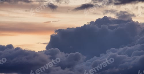 Preview: View of Cloudscape during a colorful sunset or sunrise.