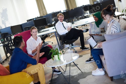 Preview: Multiethnic startup business team having team building