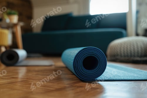 Preview: Rolled Yoga Mat on a Wood Floor