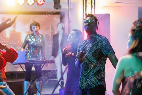 Party with Music DJ on Stage at Night
