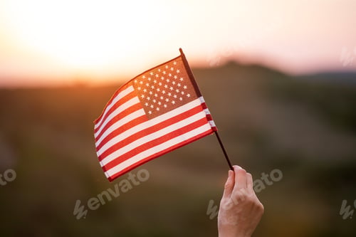 Preview: American Flag Waving Proudly at Sunset