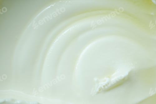 Preview: detail shot of fresh yogurt in a bowl on table