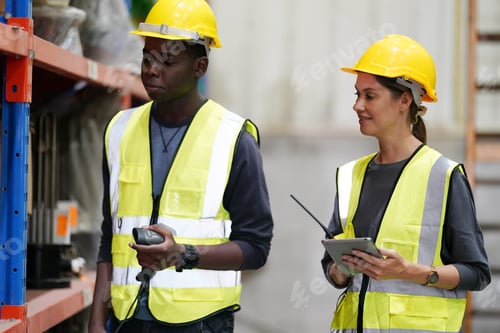 Preview: Warehouse Industrial supply chain and Logistics Companies inside. Warehouse workers checking the inv