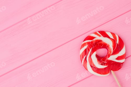 Preview: Candy on pink background.