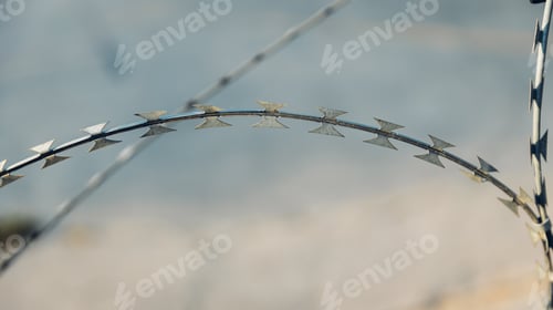 Preview: barbed wire fence of iron curtain. Barbed wire - restricted area.