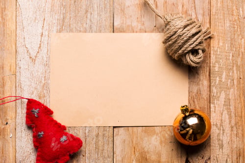 Preview: Christmas Decorations with Note on Wooden Background