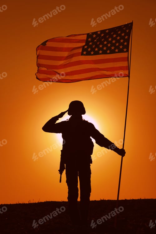 Preview: USA Soldier with flag saluting on sunset horizon